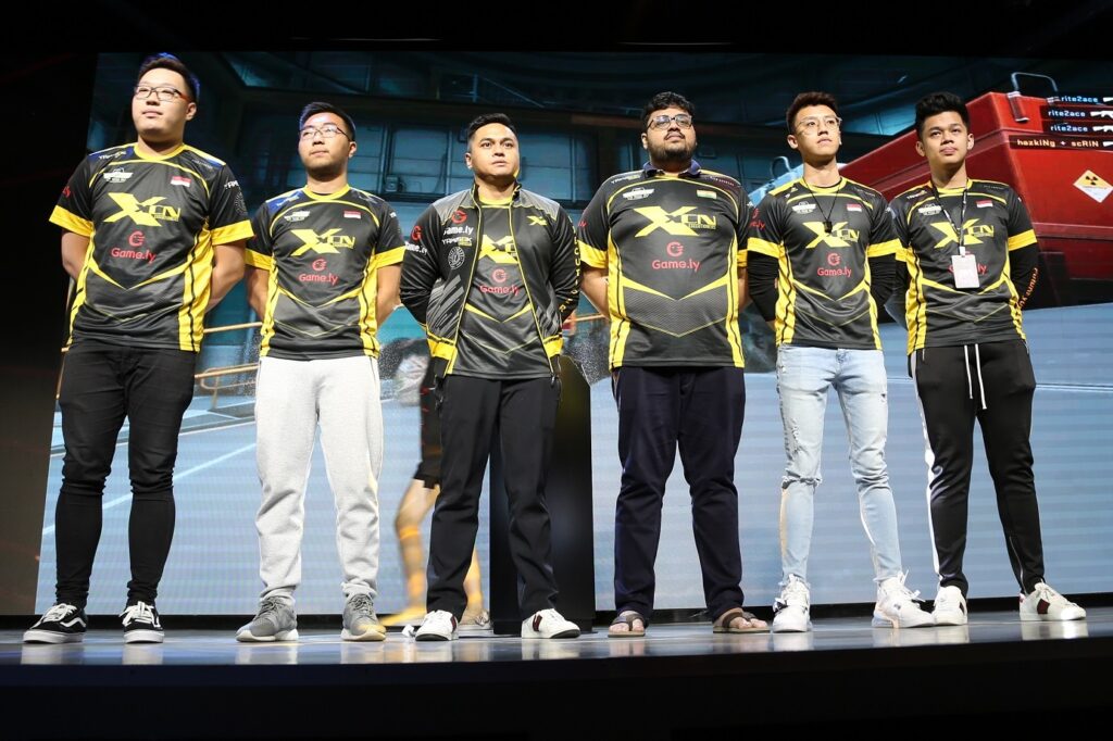 Bali (third from left) brings top-tier coaching experience to RRQ(Photo courtesy of XcN)